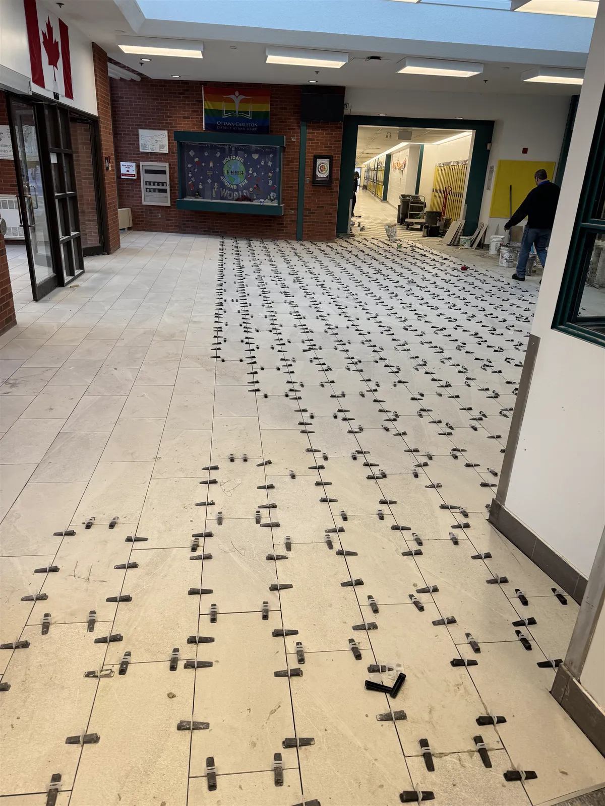 School corridor floor tile, levelled edge to edge