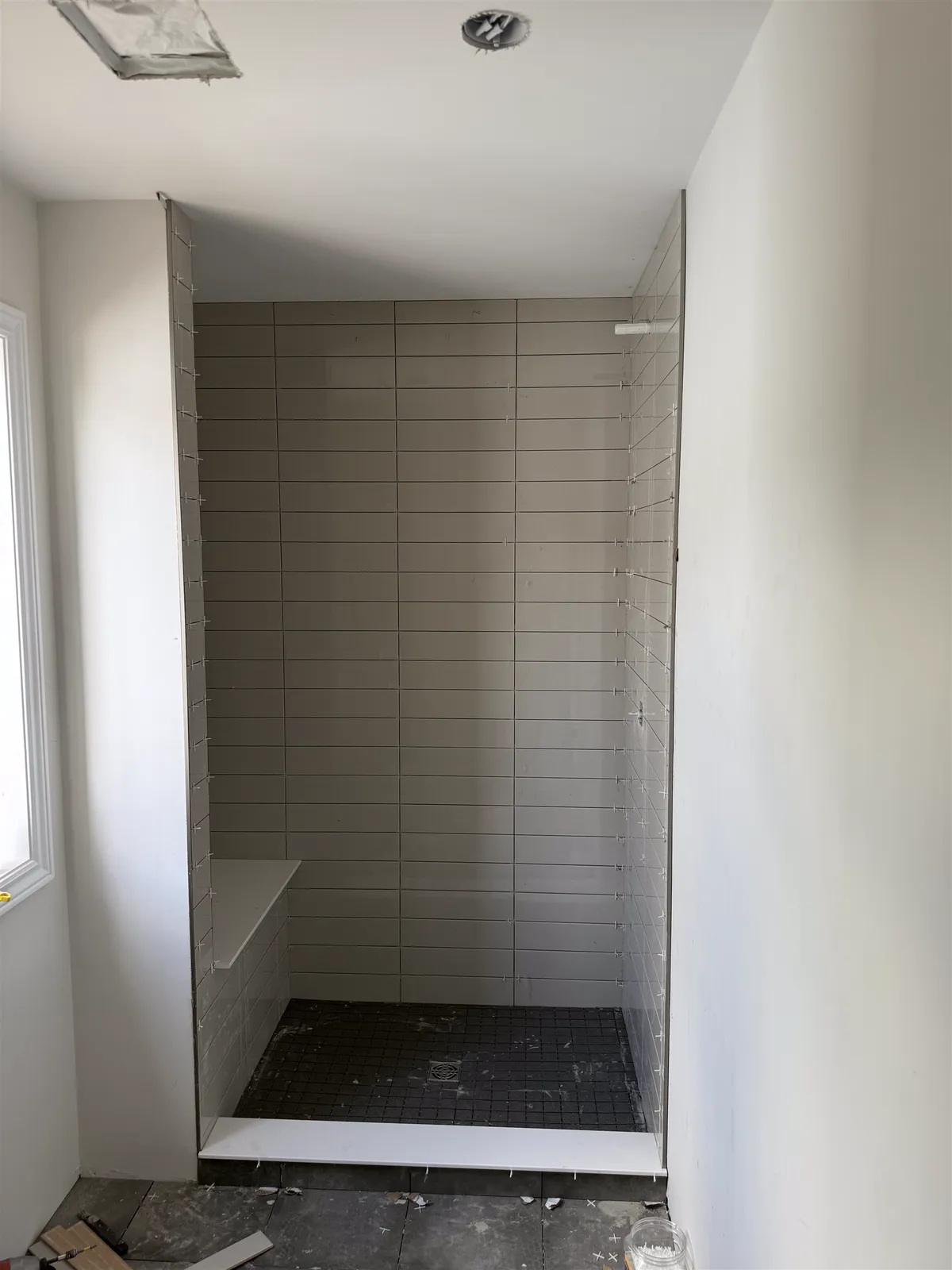 Shower with linear tile