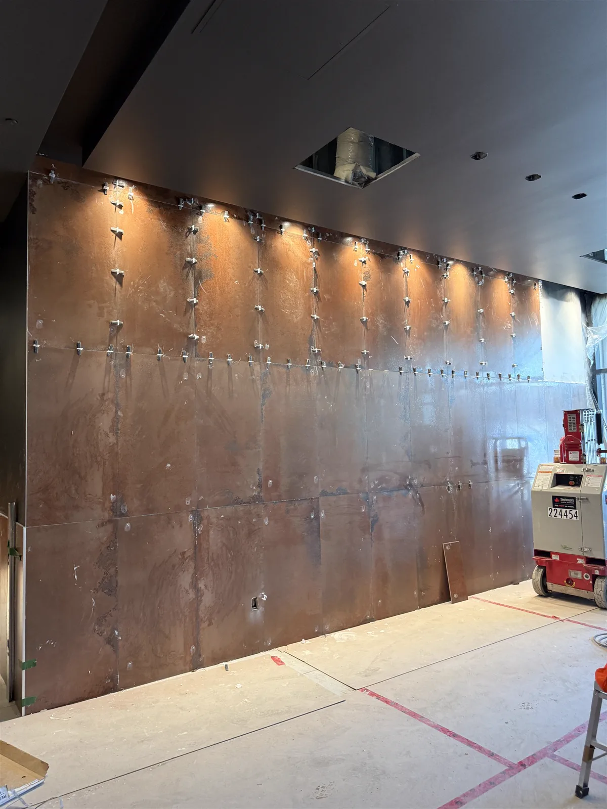 Lobby feature wall during installation