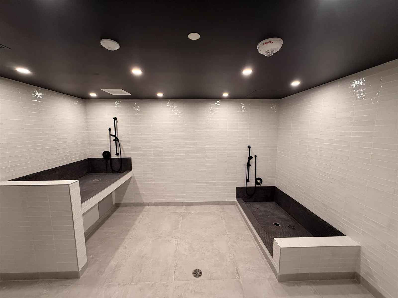 Pet wash room with two tiled wash stations