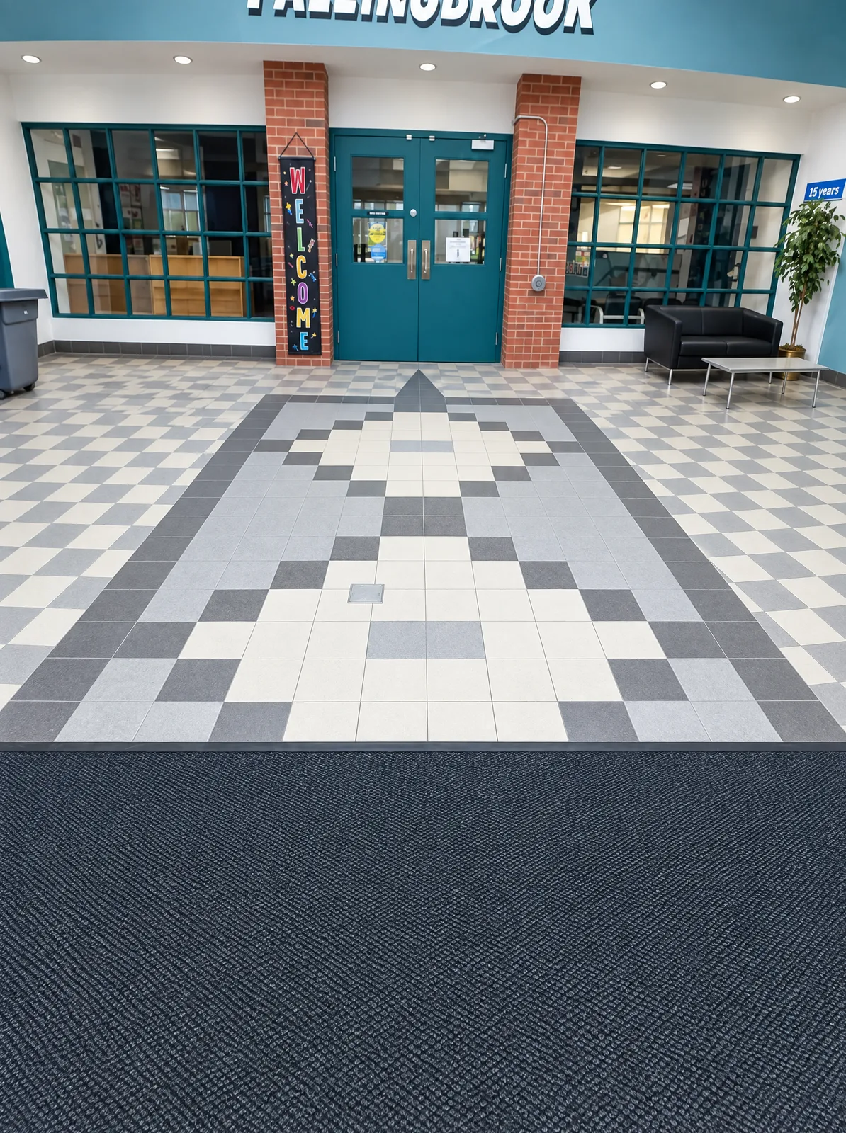 Building entrance with a patterned grey and white tile floor