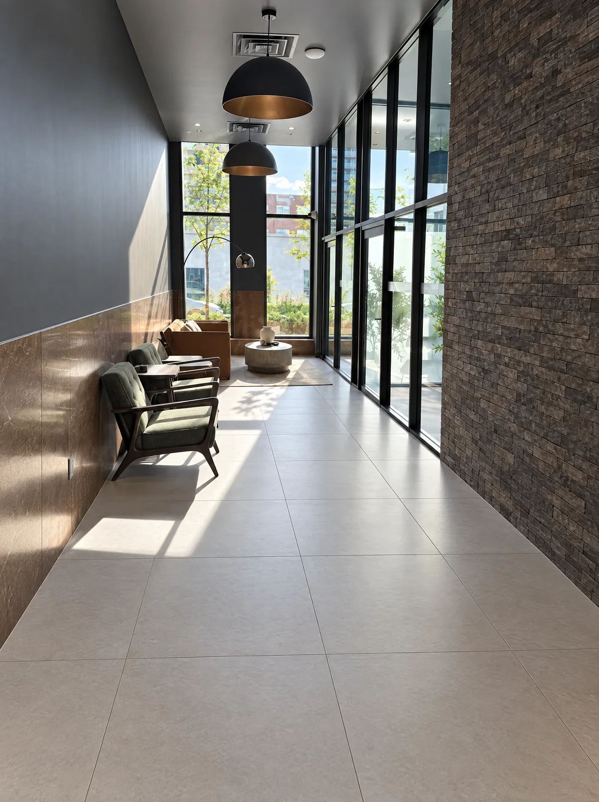 Corridor with large-format porcelain floor and brick feature wall